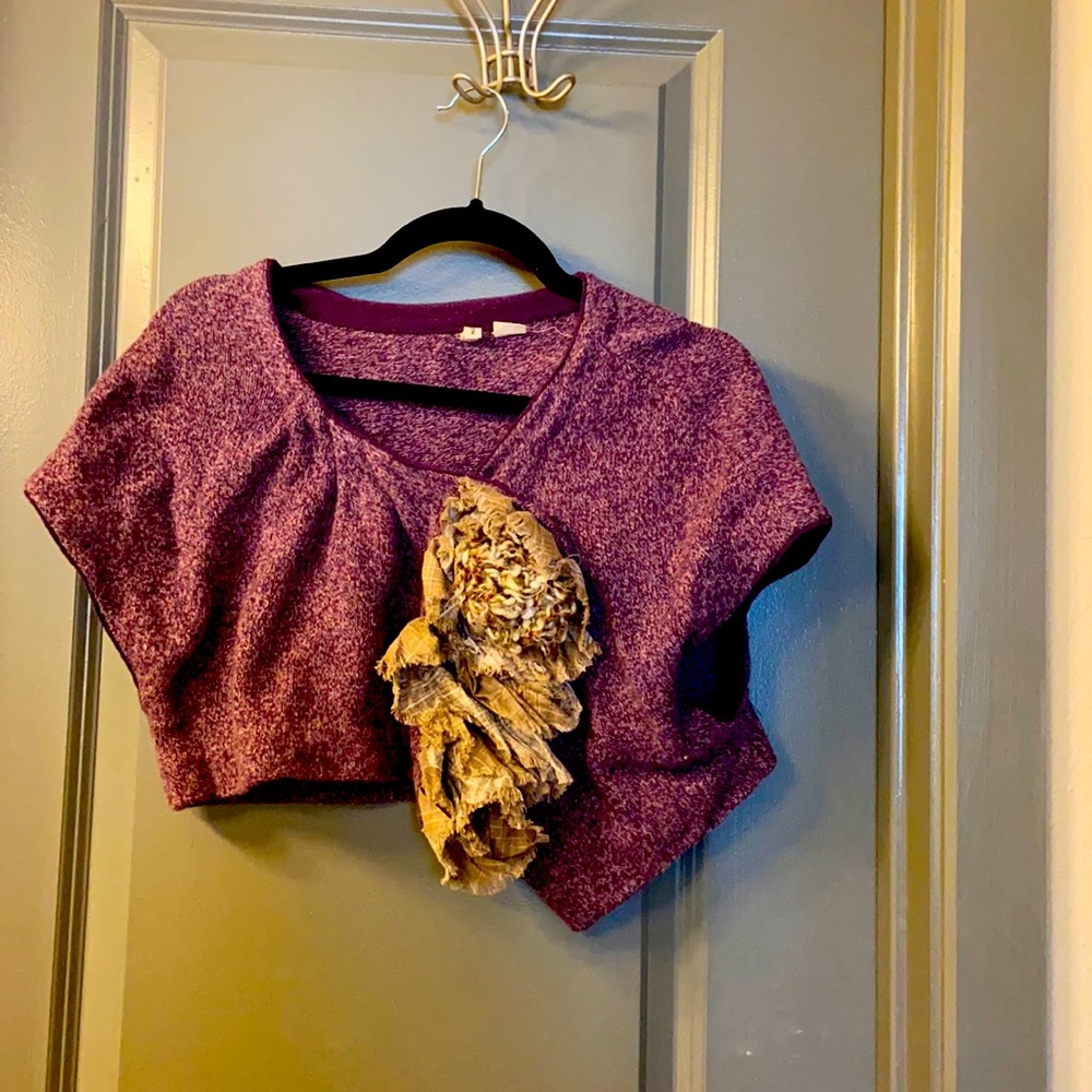 Short sleeve shrug with gray flower detailing.